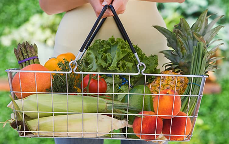 Shopping cart with vegetables