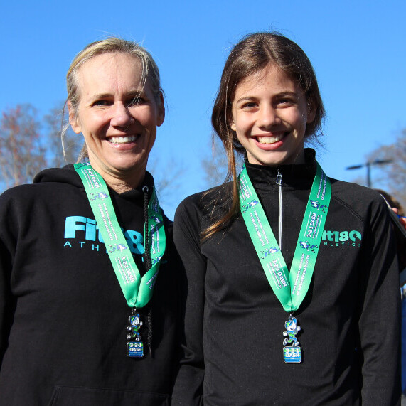 Caroll Ann with an medal winning athlete